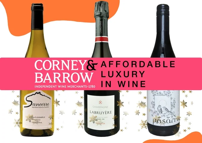 Three wine bottles with Corney & Barrow promotional banner