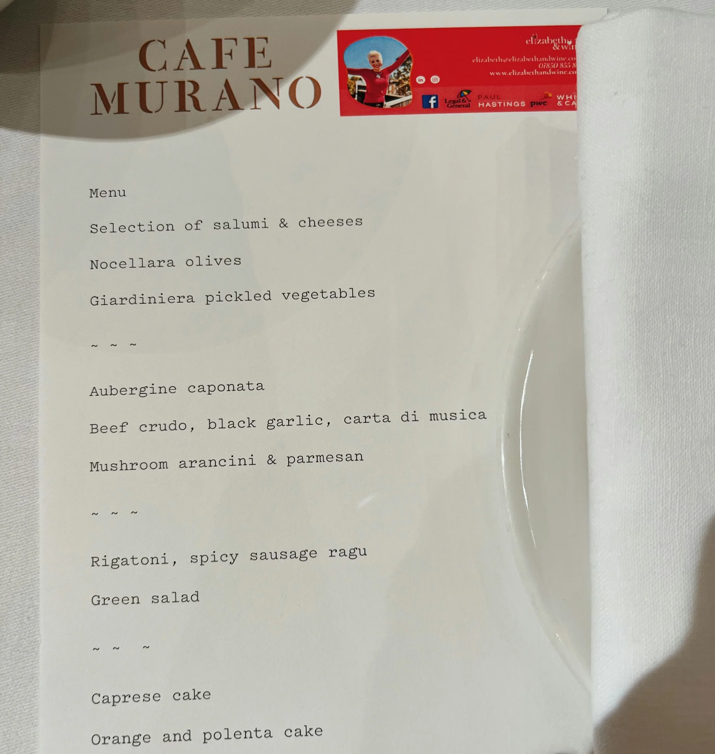 Café Murano menu listing Italian dishes and Elizabeth & Wine event branding