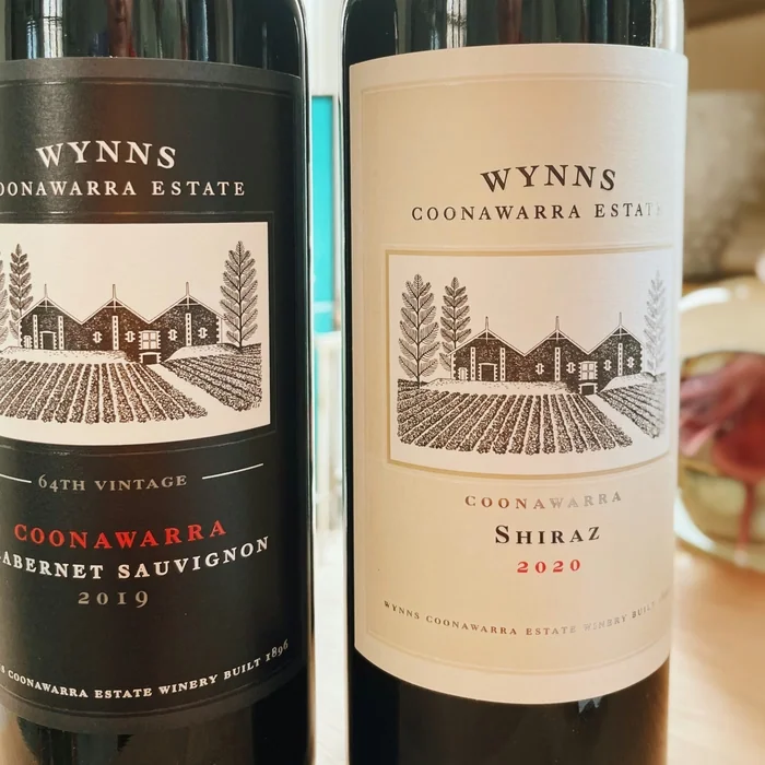 Two Wynns Coonawarra Estate wine bottles, Cabernet Sauvignon and Shiraz labels
