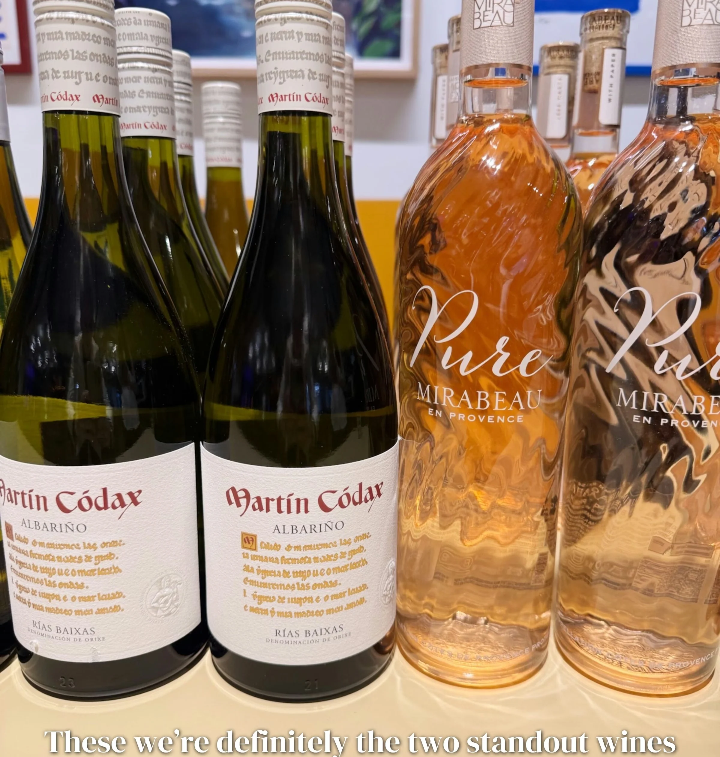 Rows of Martín Códax Albariño and Mirabeau Pure rosé wine bottles