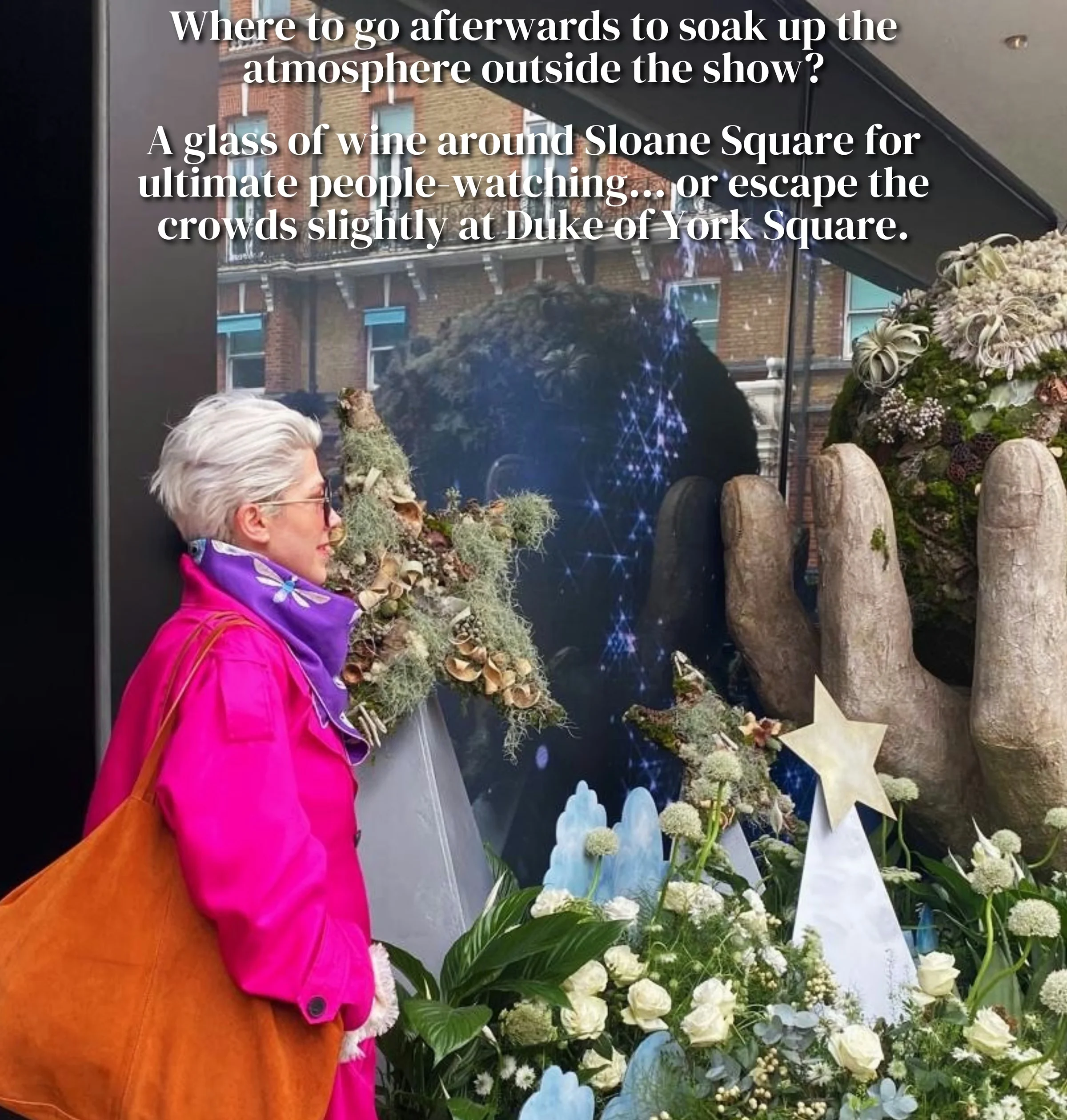 Visitor viewing a floral display beneath text about wine near Sloane Square and Duke of York Square