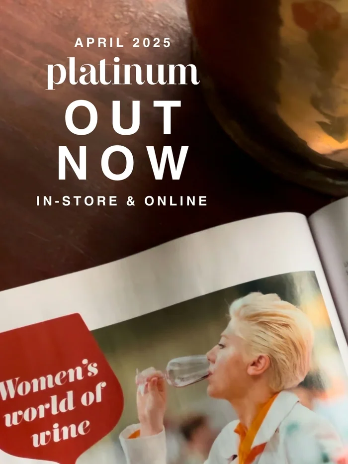 Wine magazine page with woman drinking and Platinum Out Now text