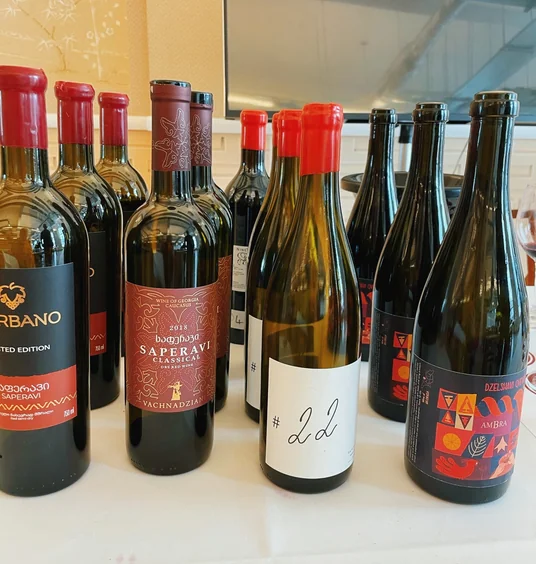 Collection of Georgian wine bottles arranged on a table