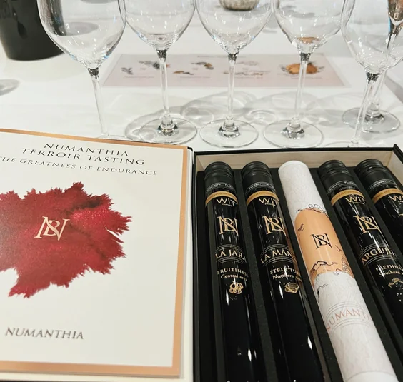 Numanthia terroir tasting set with wine bottles, tasting booklet and four wine glasses