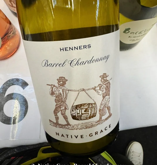Henners Native Grace Barrel Chardonnay bottle, with text naming Henners Vineyard in East Sussex