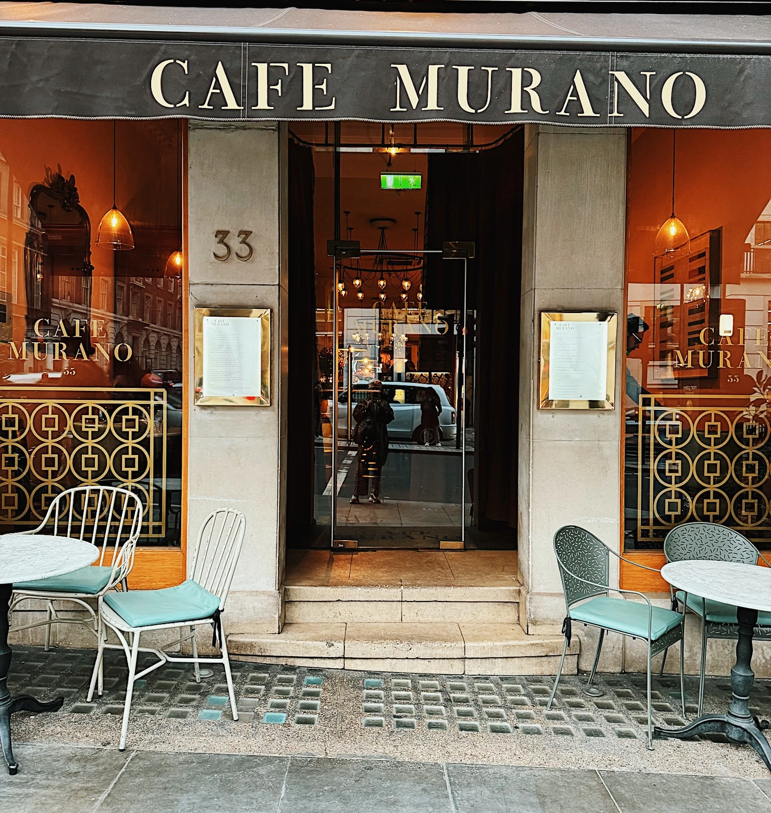 Café Murano restaurant frontage with outdoor tables and chairs
