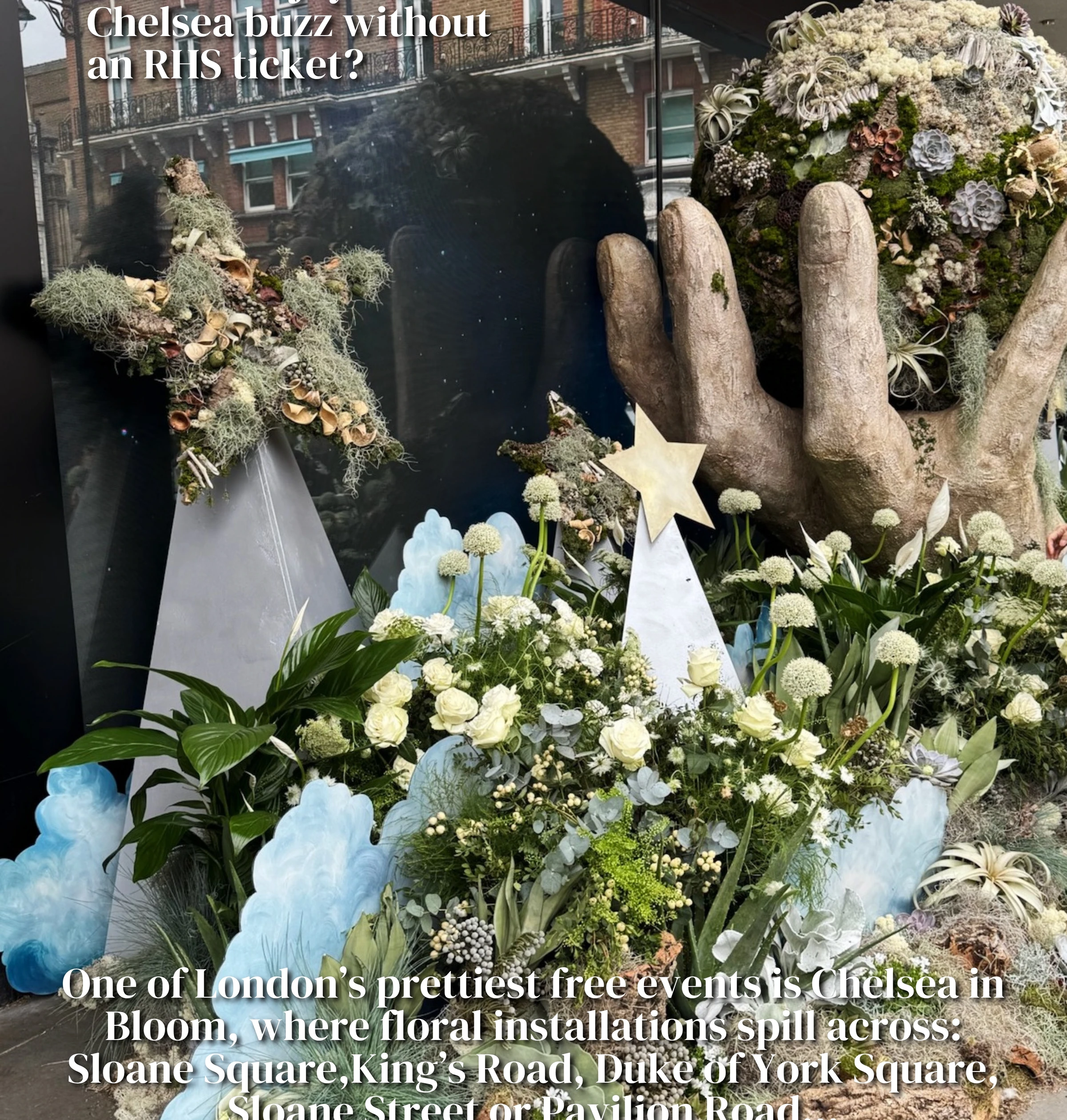 Floral installation with white and blue flowers, sculptural forms and text about Chelsea in Bloom