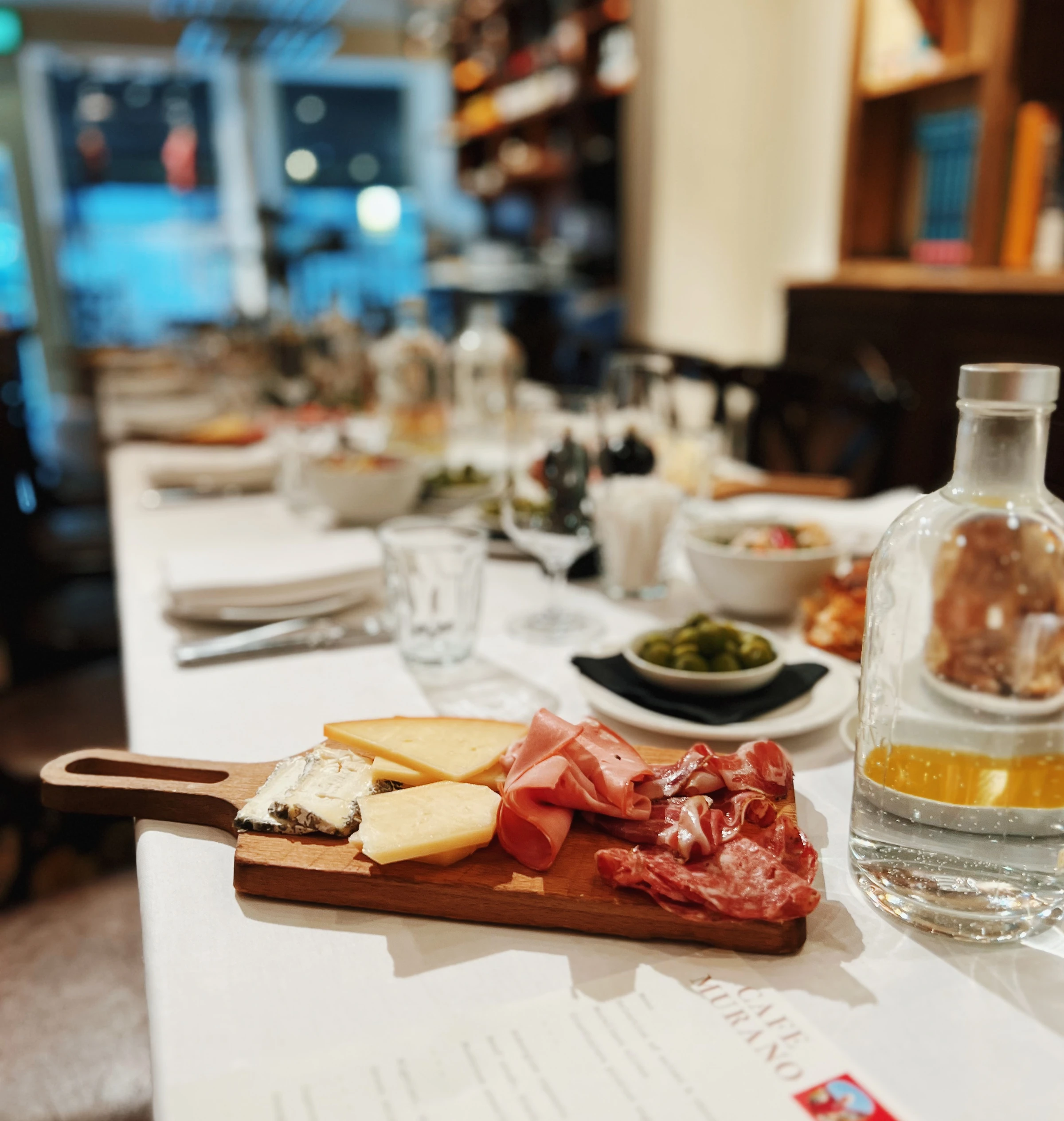Cheese and charcuterie board at a wine tasting table