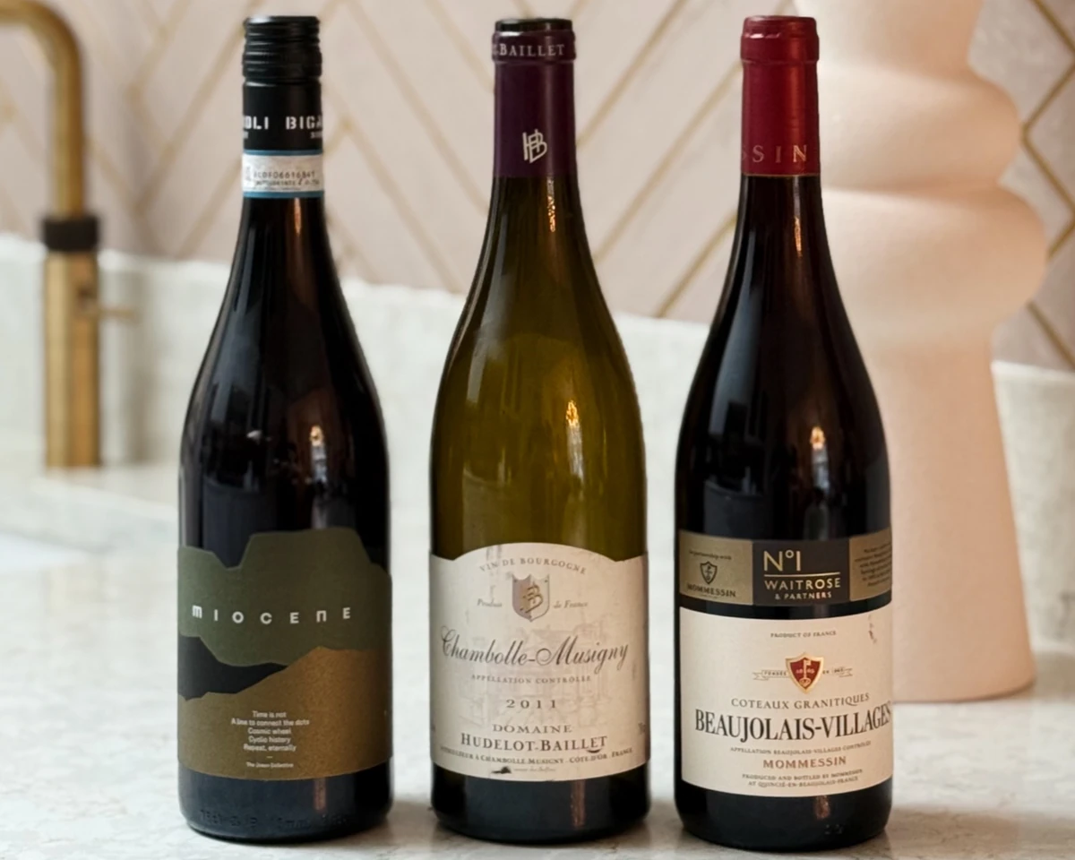 Three wine bottles, including Miocene, Chambolle-Musigny and Waitrose No.1 Beaujolais-Villages