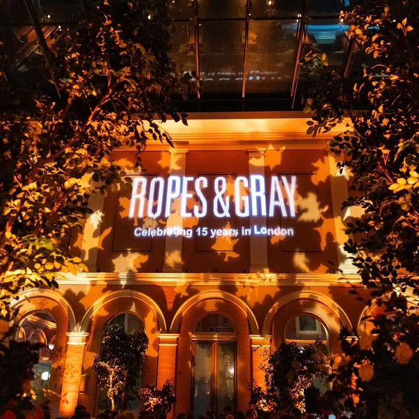 Ropes & Gray celebrating 15 years in London projected onto an illuminated building