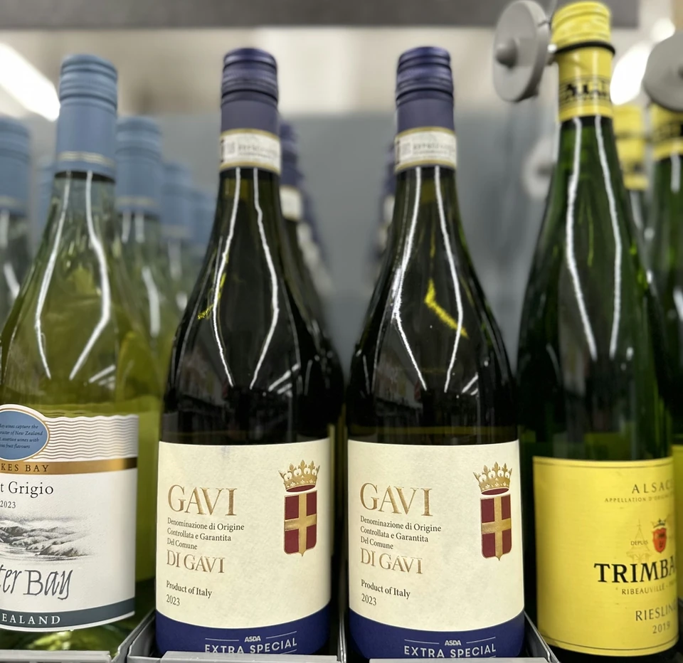 Alsace Riesling bottle displayed on a shop shelf