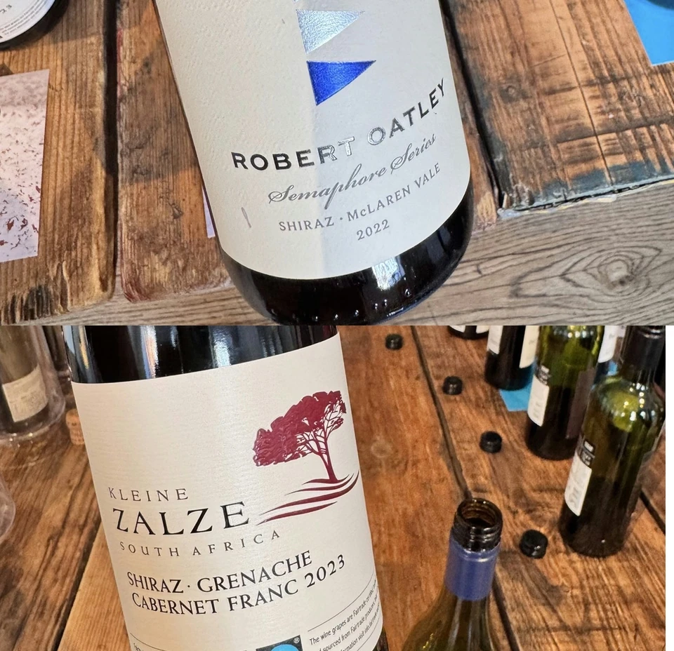 Kleine Zalze Cabernet Franc wine bottle on a wooden table