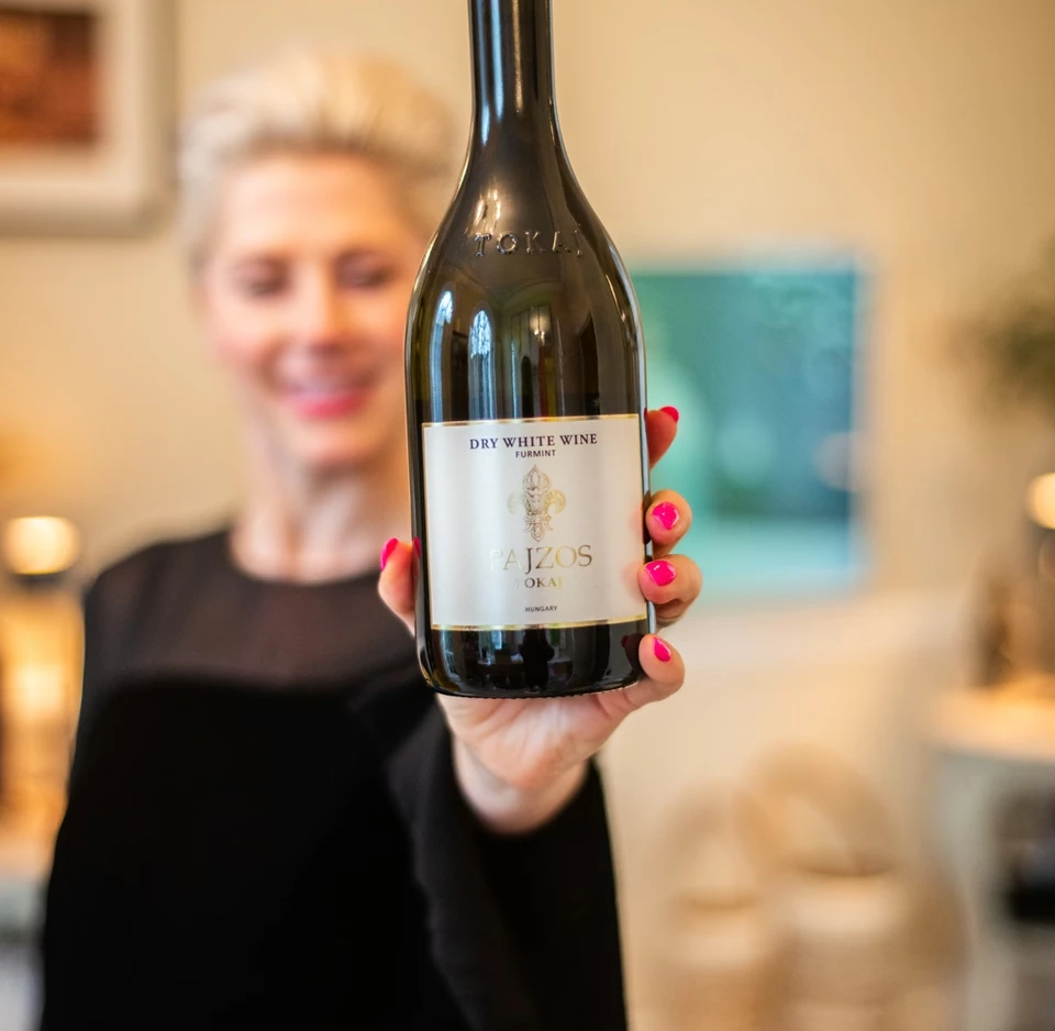 Bottle of Pajzos Tokaj dry white wine held up during a Furmint tasting