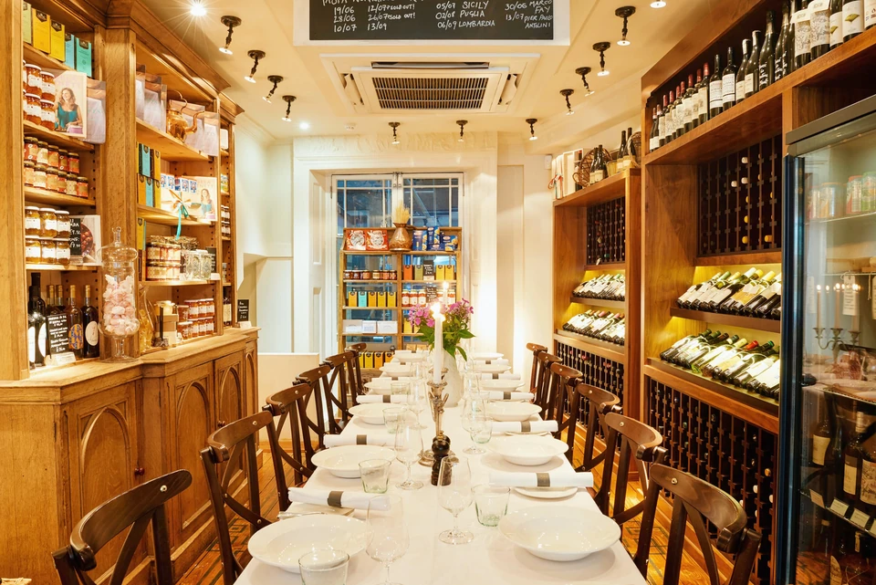Pastificio private dining room at Café Murano set for an elegant dinner