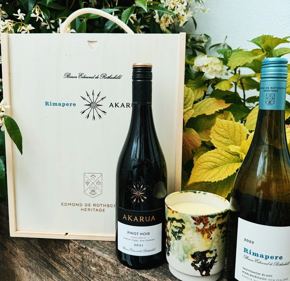 Rimapere Sauvignon Blanc bottle beside a branded presentation box and ceramic cup