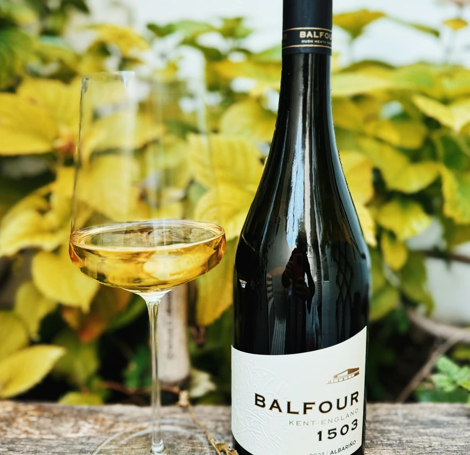 Balfour 1503 Albariño bottle beside a glass of golden wine