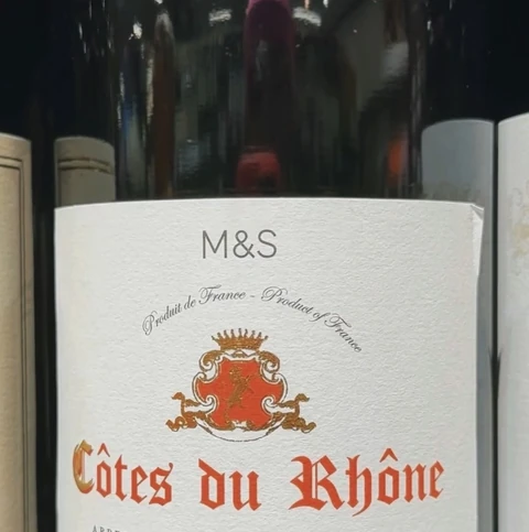 M&S Côtes du Rhône 2021 wine bottle with a cream label
