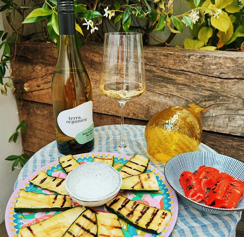 Terra Organica Sauvignon Blanc with grilled vegetables and a wine glass