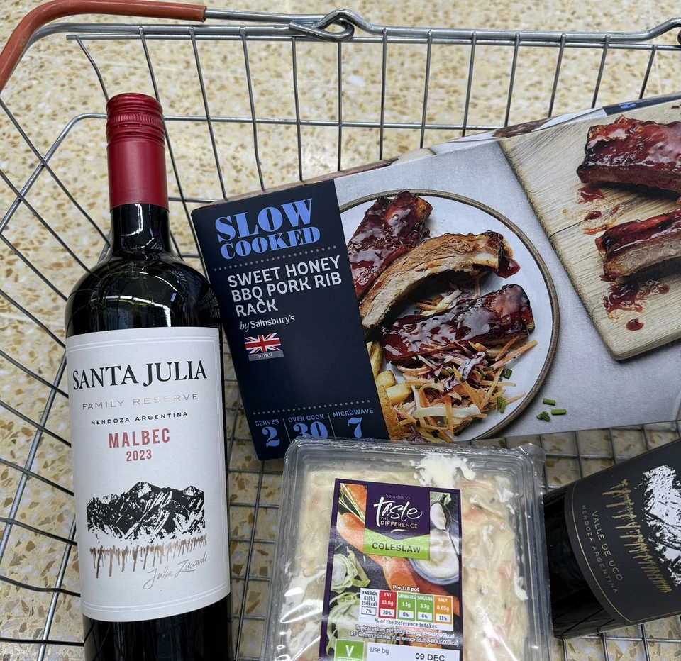 Santa Julia Malbec with barbecue ribs and coleslaw in a shopping trolley