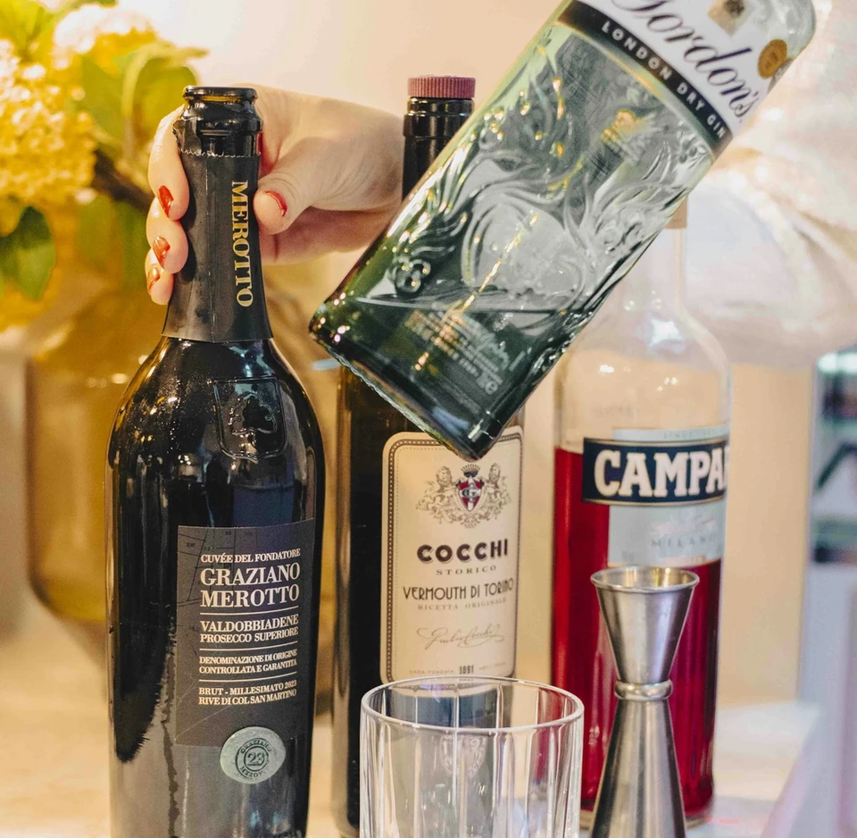 Conegliano Valdobbiadene Prosecco, vermouth and Campari arranged with a jigger and glass
