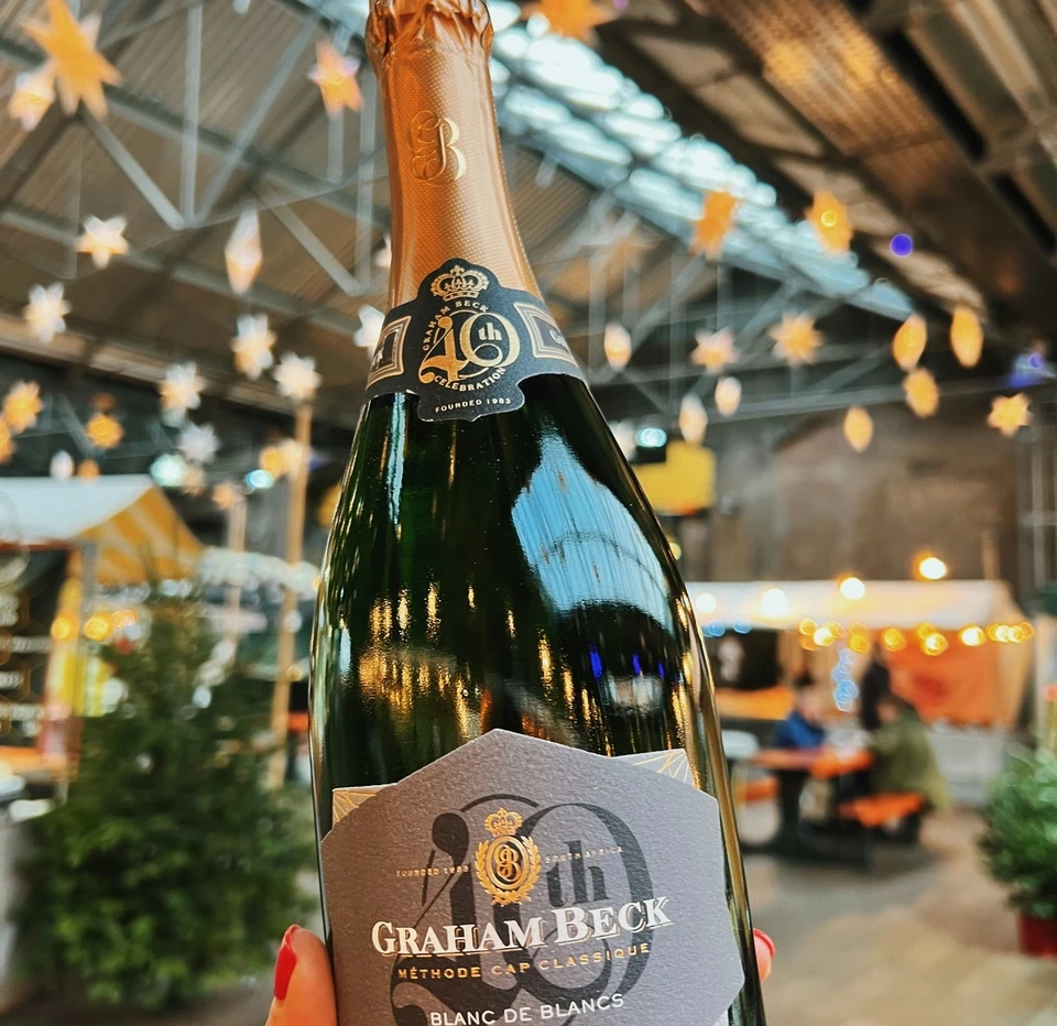 Graham Beck Blanc de Blancs 2018 bottle at a decorated anniversary event