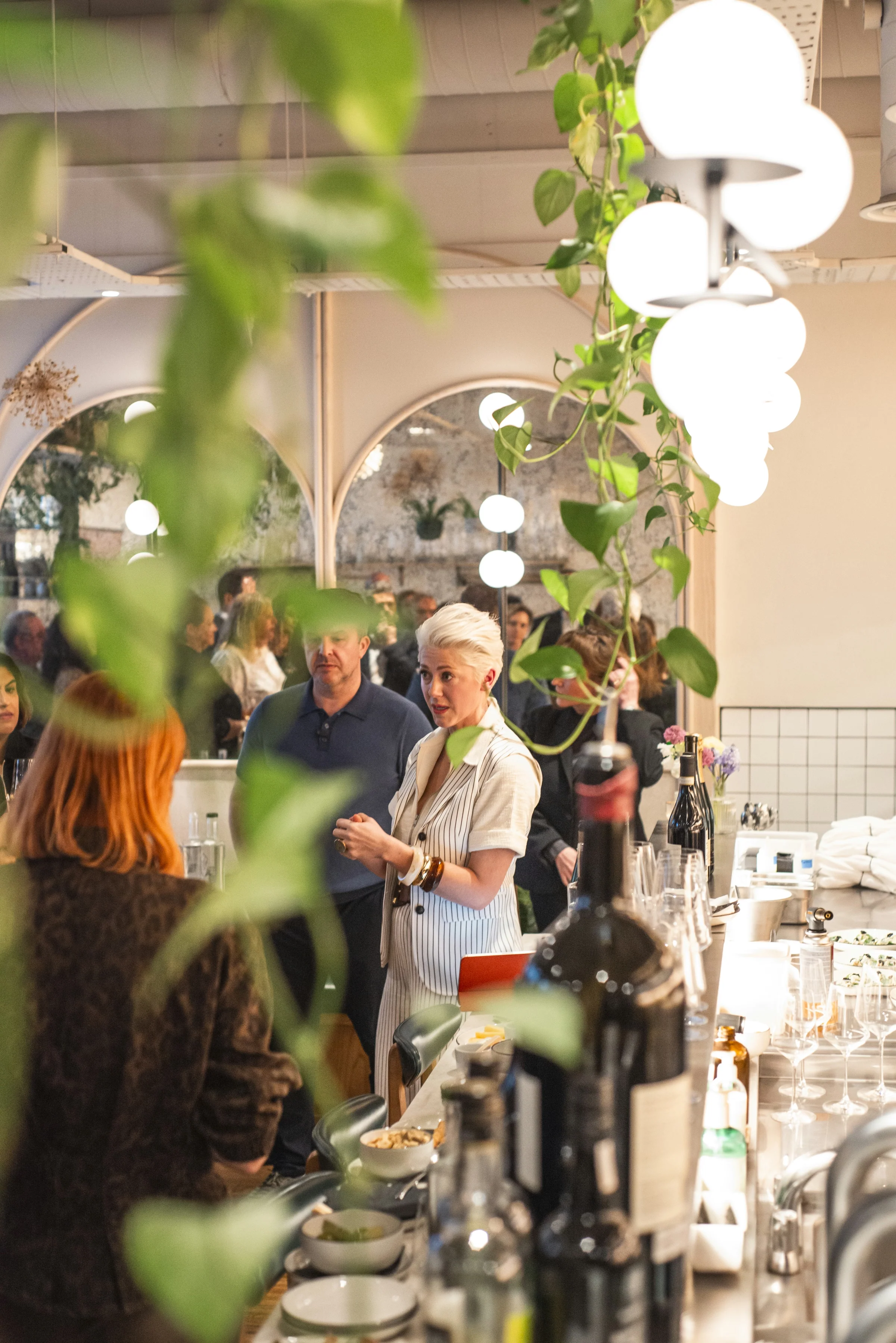 Elizabeth Hawthornthwaite talking to guests at a wine evening in a London restaurant